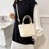 Bolso de Mano Estilo Coreano de Moda Transfronterizo Tipo Cubo para Mujer, Nuevo Bolso de Hombro con Patrón Tejido Primavera 2026, Bolso Cruzado de Gama Alta