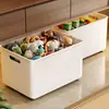 Caja de almacenamiento debajo del mueble de TV, cesta colgante para snacks y juguetes debajo de la cama, caja de almacenamiento de libros, cesta de lavandería y carrito móvil con ruedas.