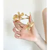 Pulsera Irregular Minimalista Versátil de Gama Alta Estilo Europeo y Americano con Flores y Hojas Entrelazadas, Brazalete Abierto Único
