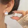 Pendientes Colgantes Estilo Minimalista Gota de Agua Cepillada Pendientes de Moda Sencillos con Temperamento Nicho Lujo Ligero Pendientes de Gama Alta Venta al por Mayor
