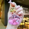 Llavero Creativo Serie Océano Relleno de Aceite Pez Payaso Estrella de Mar Pez Pequeño Colgante de Bolso Decoración de Llavero