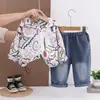 Conjunto de Primavera 2026 Novo Estilo Comércio Exterior Meninos Estampa Graffiti Manga Longa Calça Jeans Longa Casual Conjunto de Duas Peças para Bebês Meninos