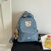 Mochila Escolar Casual Popular Retro de Grande Capacidade para Meninas 2026 Novo Estilo Moda Passeio Deslocamento Versátil Bolsa de Ombro Duplo