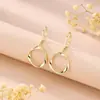Novedad Europea y Americana Estilo Simple y de Moda Anillo de Mobius Ganchos para Orejas para Mujer, Pendientes Huecos Versátiles y Elegantes, Versátil Transfronterizo