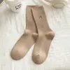 Calcetines de otoño e invierno para mujer hechos de algodón de Xinjiang, con bordado de lazo, de longitud media hasta la pantorrilla de doble aguja, calcetines largos de algodón Maillard