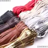 Banda de borde al por mayor cuero PU cordón de cuero cuerda de cuero banda plana tira de cuero envoltura de borde accesorios para ropa banda tejida de cuero tira de presión doble pliegue