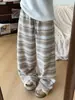Pantalones anchos de forro polar a rayas negras para mujer de Guang Apparel, nueva colección otoño/invierno 2026, corte relajado, cintura alta, pantalones casuales de pierna recta