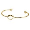 Fabricantes Europeos y Americanos en Stock Pulsera Simple de Acero Inoxidable de 2 mm con Corazón Anudado Pulsera Abierta de Corazón de Durazno para Mujer al Mayoreo