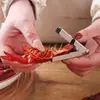 Ferramenta para descascar camarão de cozinha, especificamente projetada para lagostins. Uma ferramenta doméstica para descascar e remover facilmente as cascas e a carne sem danificar o camarão
