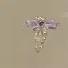Buscando Pinza para el Cabello con Borla y Lazo Estilo LightSweet Atmósfera Minimalista Francesa Moda de Lujo Ligero Accesorios para el Cabello