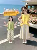 Conjunto de Top sem Mangas para Meninas 2026 Verão Novo Moda Bolinhas Calça Pantalona e Colete Conjunto de Duas Peças para Meninas Mais Velhas