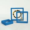 Caja de Suspensión Pe Film Spot Transfronteriza con Base Caja de Exhibición de Joyería y Juguetes Caja de Almacenamiento de Joyería Portátil y Duradera