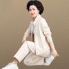 Traje de estilo nacional chino nuevo para madres, estilo occidental, chaqueta corta bordada para mujeres de mediana edad y mayores, primavera y otoño.