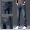 Jeans rectos azules de alta gama de Hong Kong para hombre, pantalones casuales elásticos de marca modernos de corte slim para la primavera de 2022, estilo primavera y otoño