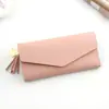 Nova Carteira Feminina Longa de Bolsa Única Estilo Coreano Moderno Carteira de Estudante Moda Simples Coração Borla Fivela Carteira Carteira