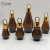 Qiaoyi Botella Marrón de Calabaza Única de 50 ml Botella de Vidrio Marrón para Aceites Esenciales Botella Mezcladora Dosificadora con Gotero Tapa de Cesta de Flores Botella para Medicina Vino