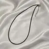 Collar de perlas de agua dulce naturales de 2 mm con diseño de nicho para mujer, cadena de clavícula personalizada de alta calidad y versátil para uso diario.