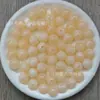 Cuentas Redondas Perforadas de Acrílico Colorido Transfronterizas Europeas y Americanas 12mm Cuentas Sueltas DIY Cadena para Teléfono Collar Pulsera Accesorios de Joyería