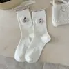 Calcetines de color crema dulce con volantes para otoño e invierno, calcetines de media pantorrilla con lazo bordado estilo girl japonés, calcetines sin costuras de algodón puro Zhuji