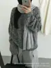 Nuevo suéter de estilo coreano, corte relajado, cuello redondo para mujer, perfecto para otoño e invierno, con un tejido suelto, grueso y suave, y un diseño simple y versátil que se puede combinar fácilmente con otros atuendos.