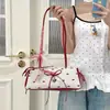 Bolsos de Color Contrastante Nicho para Mujer 2025 Nueva Moda Versátil Bolso Cruzado Dulce Cool Sexy Portátil Bolso Balde