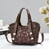 A bolsa popular mais vendida deste ano, grande capacidade feminina, novo estilo 2026, design de nicho, bolsa transversal moderna, bolsa de mão