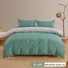 Funda de almohada con bolsillo, funda nórdica de tela cepillada de color liso, juego de tres piezas transfronterizo, funda nórdica de plumón, ropa de cama textil para el hogar de fibra ultrafina