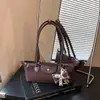 Bolso tipo baguette de lujo de nicho estilo francés, bolso tipo dumpling moderno y a la moda, adecuado para el uso diario, bolso versátil y moderno para hombro y debajo del brazo
