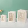 Saco de embalagem de papel kraft com janela transparente Saco de presente de flores para o dia dos namorados Saco de presente de mão Saco de pacote de flores para impressão