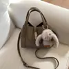 Bolsa Transversal de Ombro Único Casual da Moda com Textura Simples, Bolsa de Estilo Novo para Primavera de 2026, Bolsa Saco Feminina de Nicho