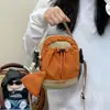 Bolsa feminina transfronteiriça novo modelo 2026, bolsa transversal casual leve para viagem com color-blocking, bolsa portátil com cordão para garrafa de água, bolsa de ombro para atividades ao ar livre
