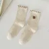 Meias de orelha de pau femininas para primavera e outono meias com renda enrolada laço ins simples versátil estudante meias cano alto