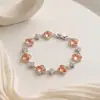 Pulseira em Formato de Trevo de Quatro Folhas Transfronteiriça para Mulheres, Luxo Leve, Design Floral de Alto Padrão, Trevo da Sorte, Joia Floral da Moda Fonte