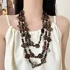 Collar de Múltiples Capas con Botones de Dopamina Estilo Étnico Cadena Larga para Suéter con Colgante de Coco y Madera Estilo Literario Retro para Mujer
