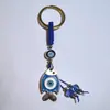 Colgante de Serie Ojo de Diablo Transfronterizo Europeo y Americano Colgante de Llavero de Joyería de Animales Ojo de Hueso con Goteo de Aceite Accesorios de Aleación para Mujeres