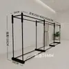 Loja de Roupas Femininas Rack de Exposição de Chão em Ferro Forjado Preto de Duas Fileiras, Espessado e Reforçado, Exibição de Roupas de Alta Estética