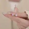 Pendientes de botón de copo de nieve de plata de ley 999 Gan Jia Venta caliente de invierno Textura simple de alta gama Exquisitos Cuidado del lóbulo de la oreja Pendientes Dropshipping