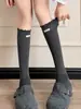 Meias 3/4 estilo miu feminino outono 2026 novas cinza com botas meias longas sem costura fio de algodão puro outono inverno tendência