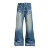 Pantalones acampanados de mezclilla con salpicaduras de graffiti desgastado para hombre, marca de moda de alta calle, lavados y desgastados con bordes deshilachados, pantalones holgados de pierna ancha