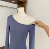 Blusa feminina de outono, ombro a ombro, justa, de manga longa, com decote na clavícula, feita de tecido Lyocell, na cor azul marinho