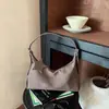 Bolso de axila de nicho simple y moderno para mujer, nuevo bolso de hombro bordado de moda, bolso de mano y bandolera versátil estilo Ins