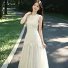 Vestido largo y suave estilo francés con top de tirantes de encaje, verano 2026