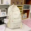 Mochila de estudiante estilo japonés de gran capacidad, mochila de estudiante dulce, bolso de doble hombro moderno y simple en esquema de colores dopamina
