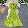 Elegante e Luxuoso Vestido de Moda Estilo Francês com Decote em V, Mangas Sino, Cintura com Amarração e Saia Longa Assimétrica