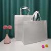 Bolsa no tejida de alta calidad bolsa no tejida gruesa en stock fabricantes comida rápida bolsa de compras ambiental al por mayor
