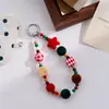 Corrente de celular com miçangas em formato de coração e estrela em blocos de cores vermelho e verde para outono e inverno de Natal, bolsa para câmera CCD, pingente personalizado