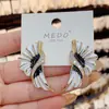 Pendientes de plata con diseño de gota de esmalte, estilo celta de Internet, de alta gama, europeos y americanos, con un toque atmosférico y combinable. Pendientes de mujer.