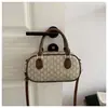 Colección nueva 2026 transfronteriza: bolso de mano de alta gama para mujer con estampado retro, bolso tote pequeño, bolso de hombro, bolso cruzado y bolso cuadrado pequeño - una opción única y elegante