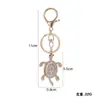 Lanzamiento Caliente Transfronterizo Llavero de Coche Tortuga Incrustado de Diamantes Aleación de Zinc Regalo Pequeño Creativo Colgante para Mochila Joyería al por Mayor