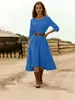 Nuevo vestido de algodón y lino de color liso, cuello redondo, manga larga, entallado a la cintura, estilo cruzado europeo y americano para mujer, longitud media, estilo casual de vacaciones, azul